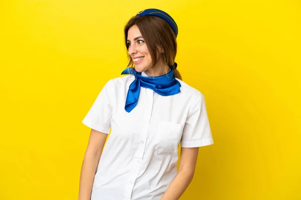 Airplane Stewardess Woman Isolated Yellow Background Looking Side — Stock Photo, Image