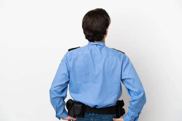 Junger Polizist Vor Isoliertem Hintergrund Weiß Rückenlage — Stockfoto