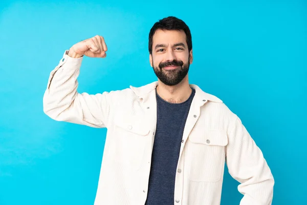 Jovem Homem Bonito Com Jaqueta Veludo Branco Sobre Fundo Azul — Fotografia de Stock