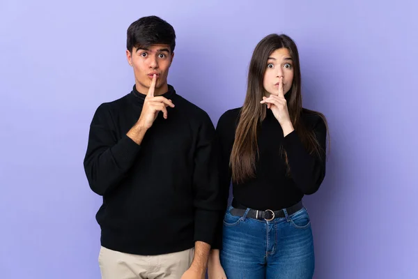 Young Couple Isolated Purple Background Showing Sign Closing Mouth Silence — Stock Photo, Image