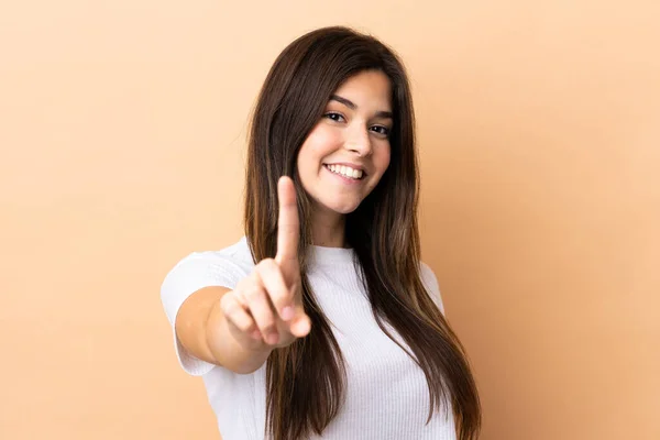 Tiener Braziliaanse Meisje Geïsoleerde Achtergrond Tonen Het Opheffen Van Een — Stockfoto