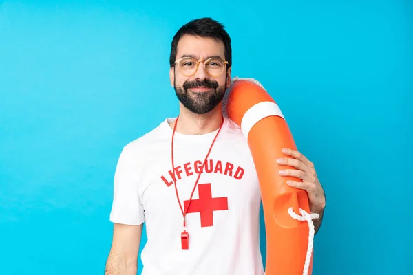 Salva Vidas Homem Sobre Isolado Fundo Azul Com Óculos Feliz — Fotografia de Stock