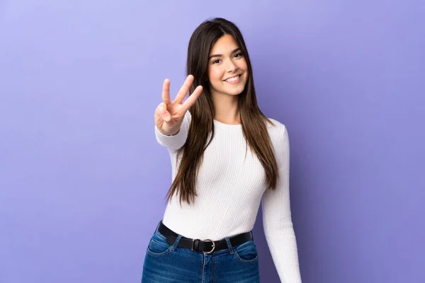 Adolescente Brasileña Chica Sobre Aislado Púrpura Fondo Feliz Contar Tres —  Fotos de Stock