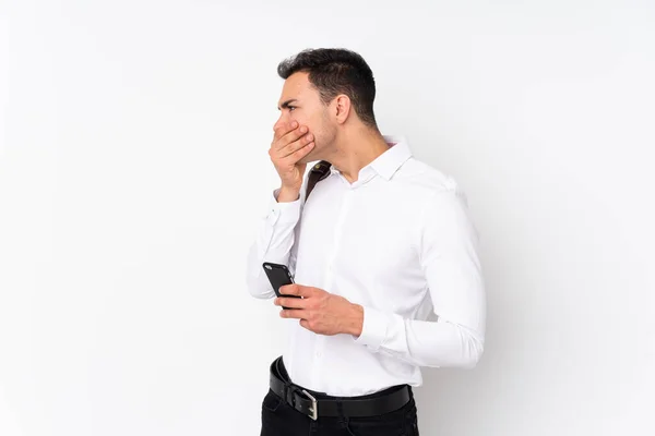 Joven Hombre Negocios Guapo Sobre Fondo Aislado Cubriendo Boca Mirando — Foto de Stock