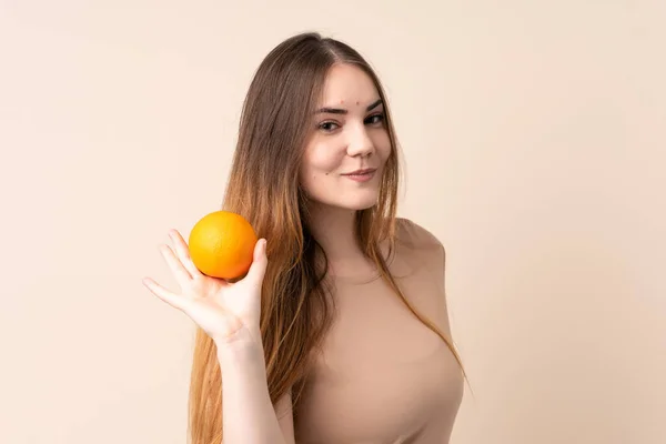 Young Caucasian Woman Holding Orange — Stock Photo, Image