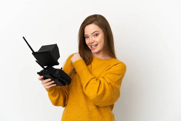 Adolescente Tenant Une Télécommande Drone Sur Fond Blanc Isolé Célébrant — Photo