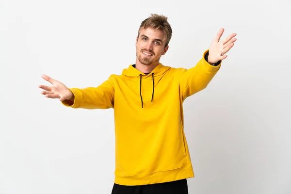 Jovem Bonito Homem Isolado Fundo Branco Apresentando Convidando Para Vir — Fotografia de Stock