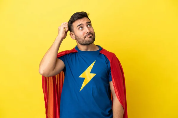 Joven Guapo Hombre Caucásico Aislado Sobre Fondo Amarillo Traje Superhéroe —  Fotos de Stock