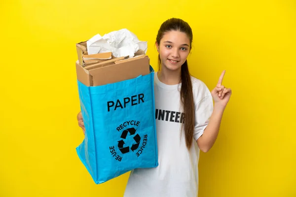 Little Girl Holding Recycling Bag Full Paper Recycle Isolated Yellow — Stock Photo, Image