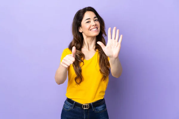 Woman Isolated Purple Background Counting Six Fingers — 图库照片