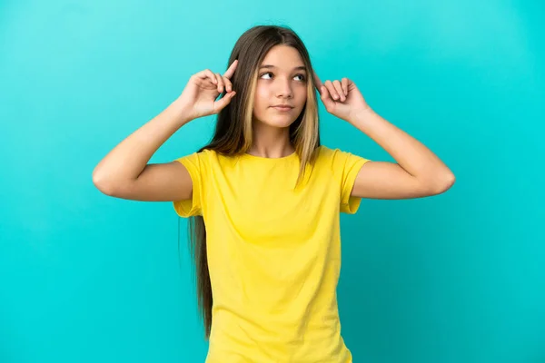 Little Girl Isolated Blue Background Having Doubts Thinking — Stock Photo, Image