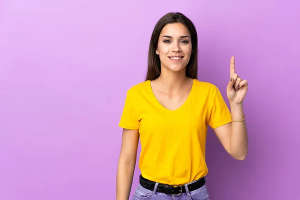 Jovem Caucasiana Sobre Fundo Isolado Apontando Para Uma Grande Ideia — Fotografia de Stock