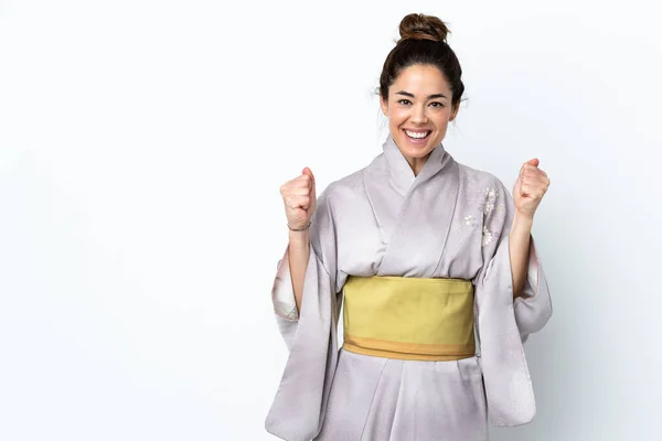 Woman Wearing Kimono Isolated Background Celebrating Victory Winner Position — 图库照片