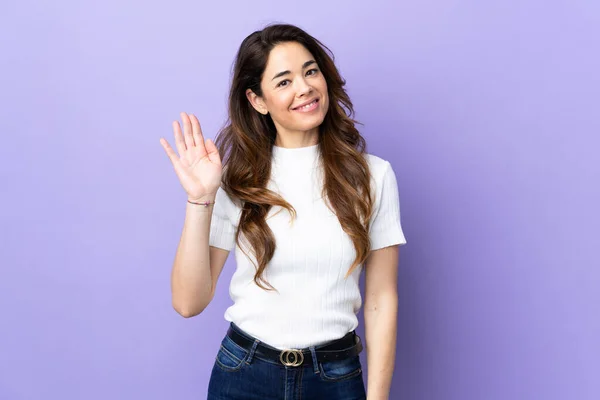 Woman Isolated Purple Background Saluting Hand Happy Expression — ストック写真