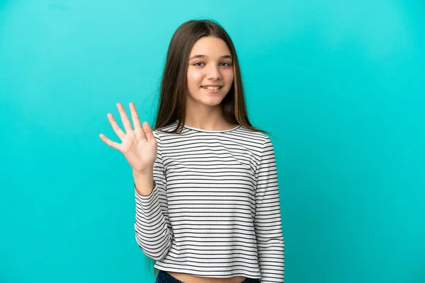 Klein Meisje Geïsoleerde Blauwe Achtergrond Salueren Met Hand Met Gelukkige — Stockfoto
