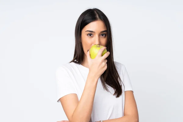 Mujer Joven Caucásica Aislada Sobre Fondo Blanco Comiendo Una Manzana —  Fotos de Stock