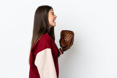 Player Brazilian woman with baseball glove isolated on white background laughing in lateral position