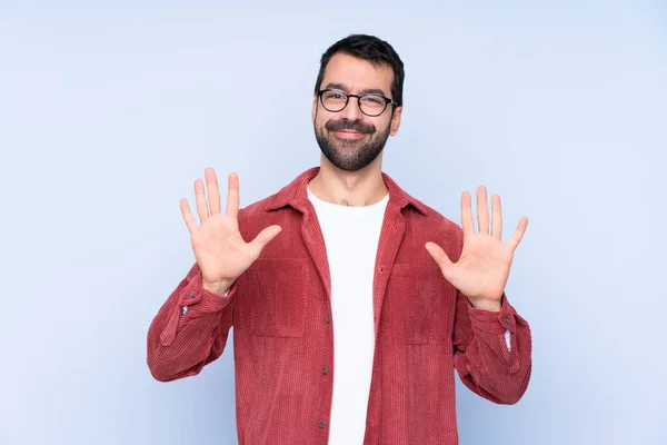 Young Caucasian Man Wearing Corduroy Jacket Blue Background Counting Ten — Φωτογραφία Αρχείου