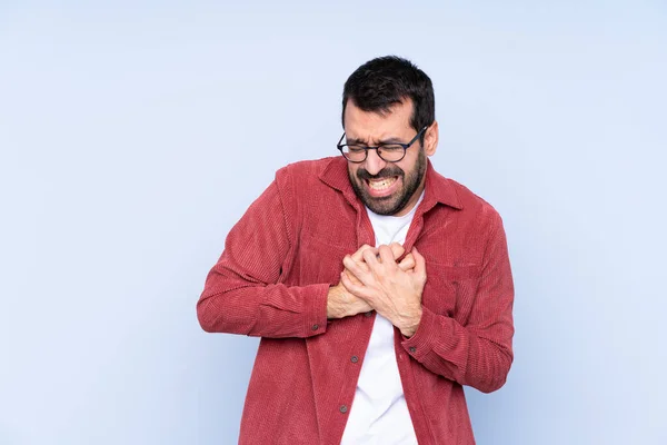 Young Caucasian Man Wearing Corduroy Jacket Blue Background Having Pain — ストック写真