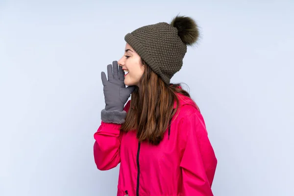 Young Girl Winter Hat Isolated Blue Background Shouting Mouth Wide — 图库照片
