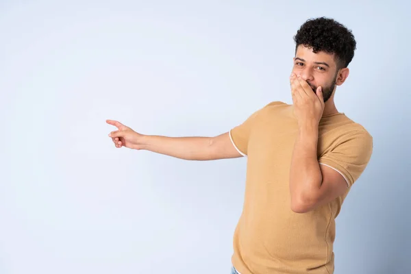 Young Moroccan Man Isolated Blue Background Surprise Expression While Pointing — Stok fotoğraf