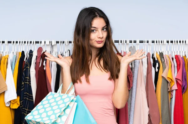 Young Caucasian Woman Buying Some Clothes Store Having Doubts While — Stock Fotó