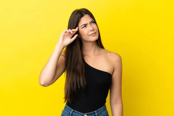 Young Brazilian Woman Isolated Yellow Background Making Gesture Madness Putting — Φωτογραφία Αρχείου