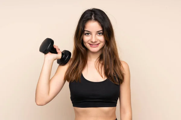 Mujer Deportiva Joven Haciendo Levantamiento Pesas Aislado Sobre Fondo Beige —  Fotos de Stock