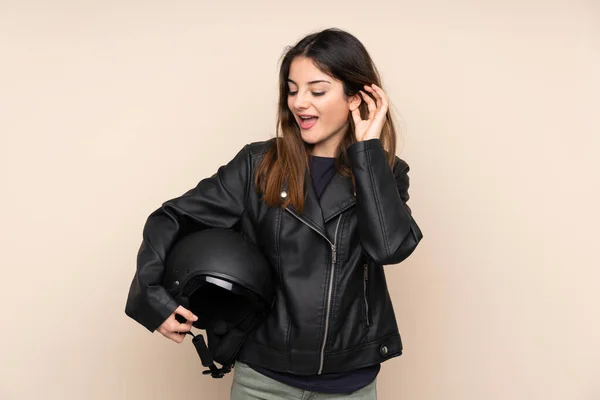 Woman Motorcycle Helmet Isolated Beige Background Listening Something — ストック写真