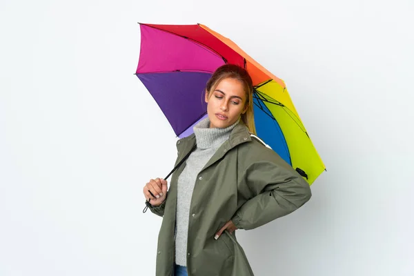 Mladá Žena Drží Deštník Izolované Bílém Pozadí Trpí Bolestí Zad — Stock fotografie