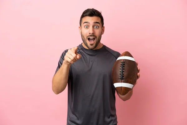 Young Caucasian Man Playing Rugby Isolated Pink Background Surprised Pointing — Stock Photo, Image