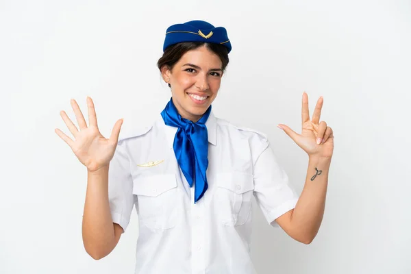 飛行機スチュワーデス原因アジアの女性は8本指で数える白い背景に隔離 — ストック写真
