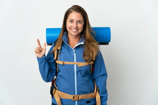 Middle Age Mountaineer Woman Big Backpack Isolated Background Showing Lifting — Stock Photo, Image