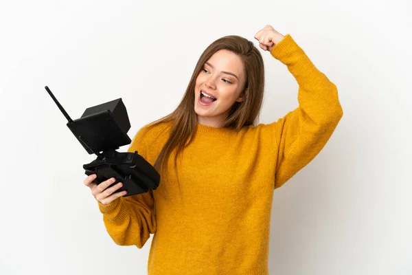 Adolescente Tenant Une Télécommande Drone Sur Fond Blanc Isolé Célébrant — Photo