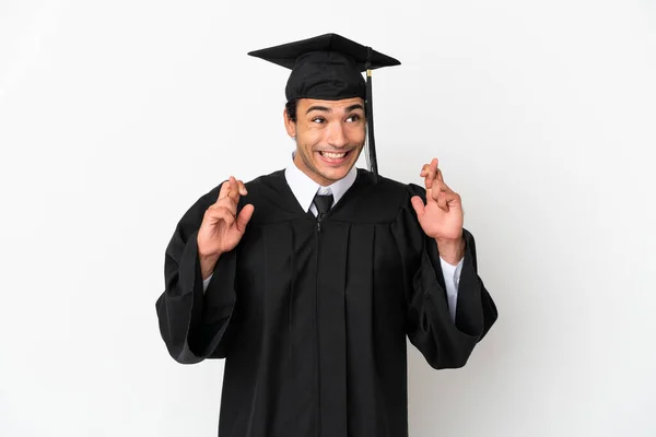 Jonge Universiteit Afgestudeerd Geïsoleerde Witte Achtergrond Met Vingers Kruisen — Stockfoto