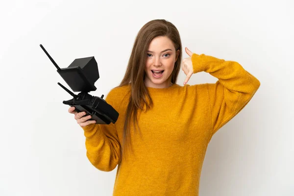 Adolescente Tenant Une Télécommande Drone Sur Fond Blanc Isolé Faisant — Photo