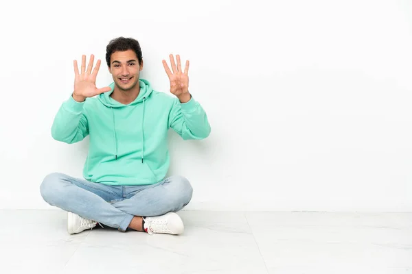 Caucasian Handsome Man Sitting Floor Counting Nine Fingers — Stok fotoğraf