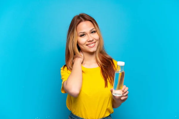 Teenager Girl Bottle Water Isolated Blue Background Laughing — Stock Photo, Image