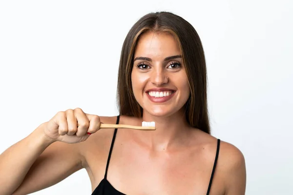 Jonge Uruguayaanse Vrouw Geïsoleerd Witte Achtergrond Met Een Tandenborstel Gelukkige — Stockfoto