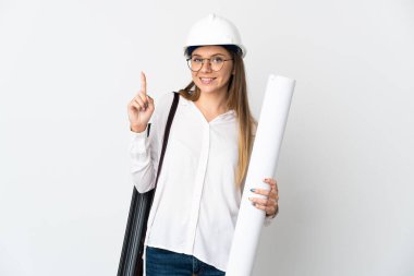 Young Lithuanian architect woman with helmet and holding blueprints isolated on white background showing and lifting a finger in sign of the best