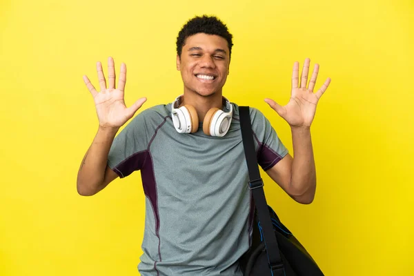 Young Sport African American Man Sport Bag Isolated Yellow Background — Foto Stock