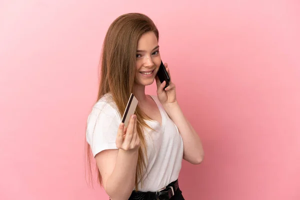 Teenager Girl Isolated Pink Background Keeping Conversation Mobile Phone Holding — Stock Photo, Image