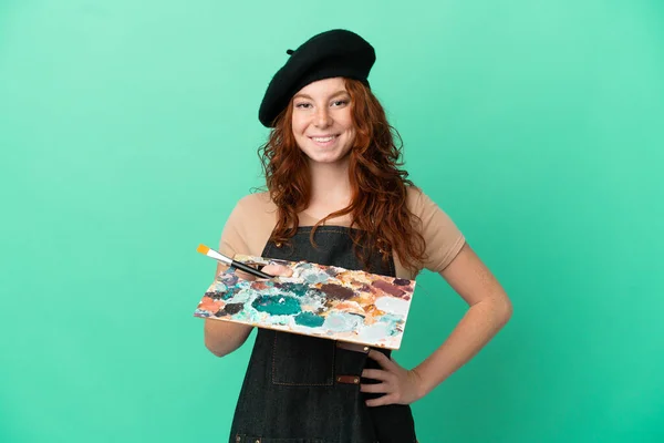 Teenager Redhead Artist Holding Palette Isolated Green Background Posing Arms — Stock Photo, Image