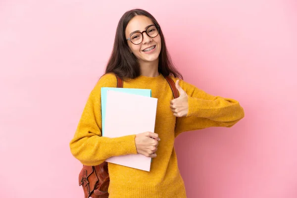 Junge Studentin Mit Isoliertem Hintergrund Zeigt Daumen Nach Oben — Stockfoto