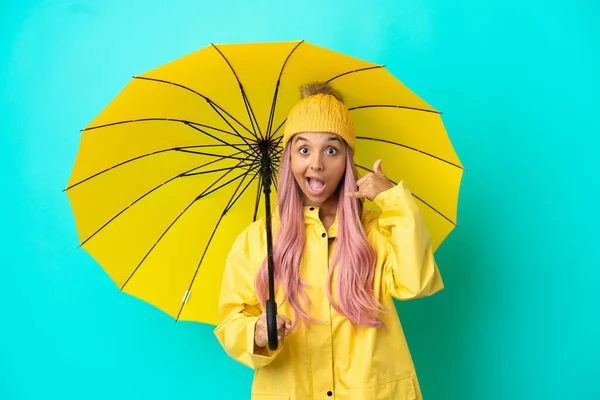 Young Mixed Race Woman Rainproof Coat Umbrella Making Phone Gesture — Stock Photo, Image