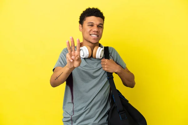 Young Sport African American Man Sport Bag Isolated Yellow Background — Stok fotoğraf