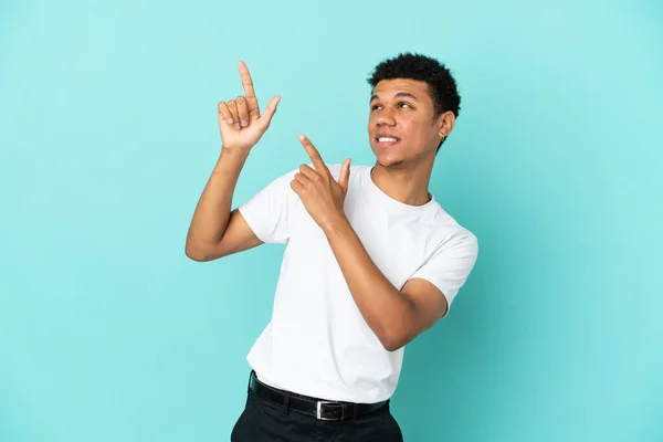 Young African American Man Isolated Blue Background Pointing Index Finger — Stok fotoğraf