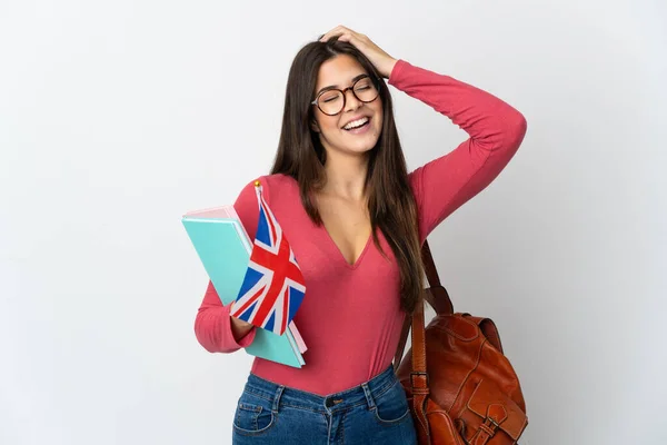 Nastolatka Brazylijka Trzyma Flagę Wielkiej Brytanii Odizolowany Białym Tle Uśmiechając — Zdjęcie stockowe