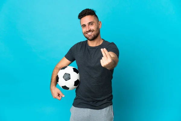 Ποδόσφαιρο Παίκτης Απομονώνονται Μπλε Φόντο Κάνοντας Χειρονομία Χρήματα — Φωτογραφία Αρχείου