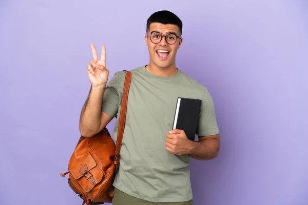 Hombre Estudiante Guapo Sobre Fondo Aislado Sonriendo Mostrando Señal Victoria — Foto de Stock